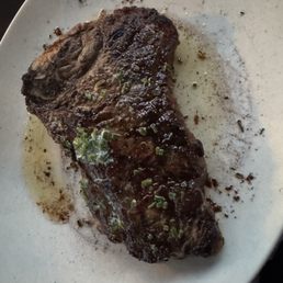 Kansas steak on sizzling hot plate