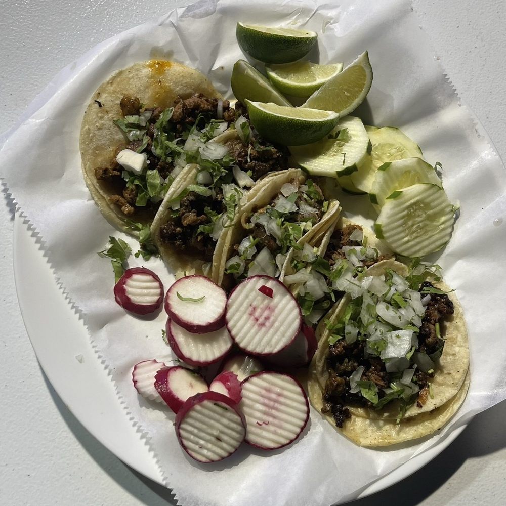 Taqueria Chisco - a plate of food on a table - Tacos Near Me Taqueria Chisco - a plate of food on a table - Tacos Near Me