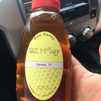 BZ Honey - a hand holding a bottle of honey - Farmers Market Near Me - Tomball, Texas BZ Honey - a hand holding a bottle of honey - Farmers Market Near Me - Tomball, Texas