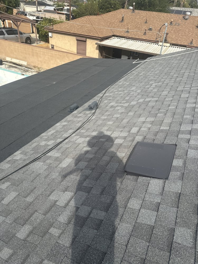 Slide of T’S Roofing