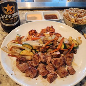 Shima - The full meal. Shima Steak and Shrimp combo, fried rice, and large Sapporo beer - tender but bland - meh - Sushi Bars Near Me - Huntington Beach, California Shima - The full meal. Shima Steak and Shrimp combo, fried rice, and large Sapporo beer - tender but bland - meh - Sushi Bars Near Me - Huntington Beach, California