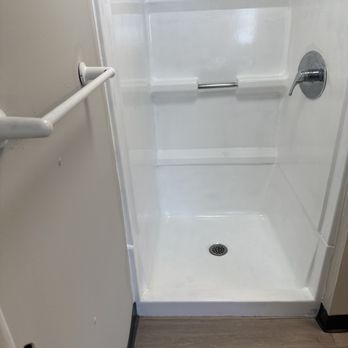 Utopia Construction and Designs - Shower refresh - Flooring Near Me