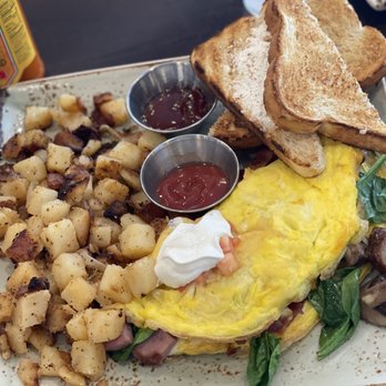 First Watch - The Works Omelette with spinach. - Breakfast & Brunch Near Me - Brandon, Florida First Watch - The Works Omelette with spinach. - Breakfast & Brunch Near Me - Brandon, Florida