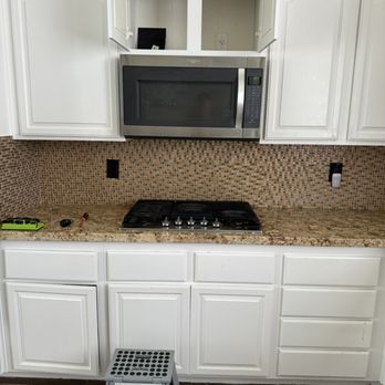A Maine Guy Handyman Services - Before:  Previous microwave with no duct to vent smoke out the house - Handyman Near Me - Henderson, Nevada