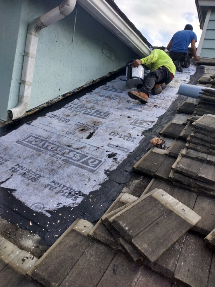 Slide of Carlos Roofing