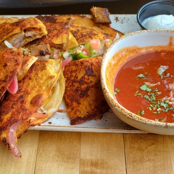 Tio Taco + Tequila Bar - Special: Short rub birria quesadilla - Mexican Near Me - Edison, New Jersey Tio Taco + Tequila Bar - Special: Short rub birria quesadilla - Mexican Near Me - Edison, New Jersey