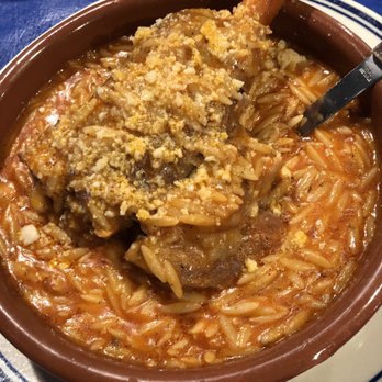Pithari Taverna - Lamb shank over orzo - Greek Near Me - Highland Park, New Jersey Pithari Taverna - Lamb shank over orzo - Greek Near Me - Highland Park, New Jersey