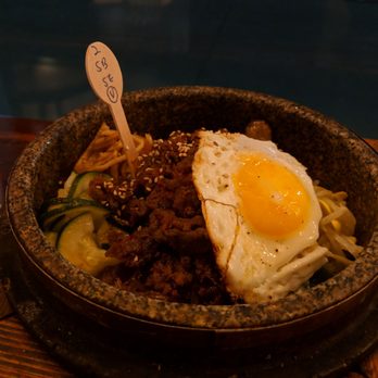 Burning Rice - Stone bowl with a fried egg. - Korean Near Me - Frisco, Texas Burning Rice - Stone bowl with a fried egg. - Korean Near Me - Frisco, Texas
