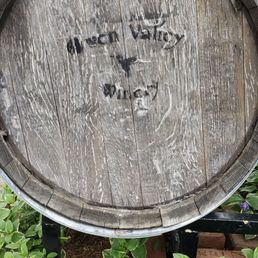 a wooden barrel in the garden a wooden barrel in the garden