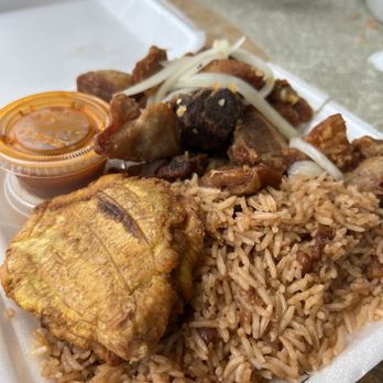 Cecibon Restaurant - Griot (fried pork) w/ red beans and rice, pikliz, and sauce - Haitian Near Me - Miami, Florida Cecibon Restaurant - Griot (fried pork) w/ red beans and rice, pikliz, and sauce - Haitian Near Me - Miami, Florida