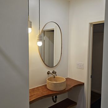 SummitForge Construction - Turning outdated bathrooms into stunning sanctuaries. Another project completed, another happy client! - Painters Near Me