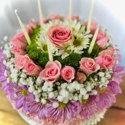 Ellington's Florist & Greenhouse - Birthday Cake made of flowers.