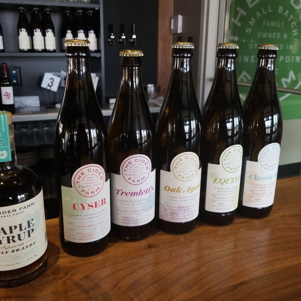 The Cider Farm - 5 of the 6 currently available ciders with a brandy maple syrup. - Cideries Near Me - Madison, Wisconsin The Cider Farm - 5 of the 6 currently available ciders with a brandy maple syrup. - Cideries Near Me - Madison, Wisconsin