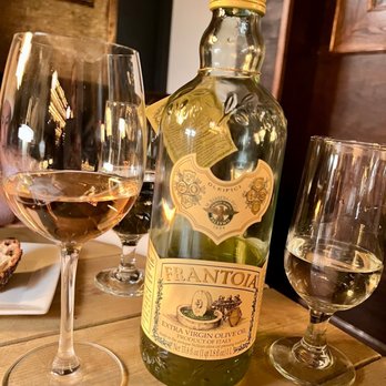 Bocca di Bacco Hell's Kitchen - a bottle of brandy and two glasses of wine - Italian Near Me - New York, New York Bocca di Bacco Hell's Kitchen - a bottle of brandy and two glasses of wine - Italian Near Me - New York, New York