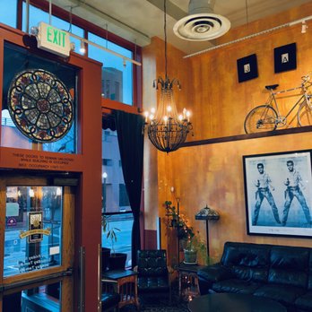 Java Downtown - There is a black couch on your left as you walk in. - Coffee & Tea Near Me - Boise, Idaho Java Downtown - There is a black couch on your left as you walk in. - Coffee & Tea Near Me - Boise, Idaho