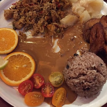 La Cantina Cubana - A tasty pork dish with fried banana and yucca root. - Cuban Near Me - Brussels, BRU La Cantina Cubana - A tasty pork dish with fried banana and yucca root. - Cuban Near Me - Brussels, BRU