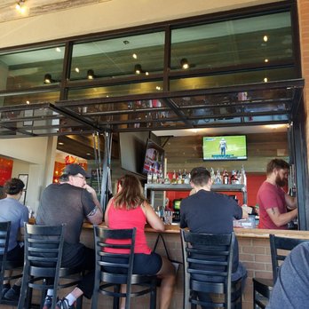Torchy's Tacos - Outside patio looking into bar area - Tex-Mex Near Me - Round Rock, Texas