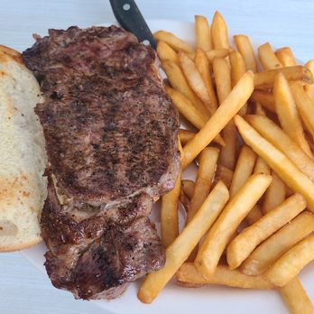 Sunset Inn Restaurant - Steak sandwich ordered on a hoagie roll and extra crispy feies - Breakfast & Brunch Near Me - Amboy, Illinois Sunset Inn Restaurant - Steak sandwich ordered on a hoagie roll and extra crispy feies - Breakfast & Brunch Near Me - Amboy, Illinois