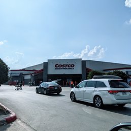 Exterior outside entrance of Costco Wholesale - Parking Lot - San Antonio, Texas Exterior outside entrance of Costco Wholesale - Parking Lot - San Antonio, Texas