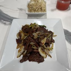 Flaming Wok - Mongolian beef with fried rice.