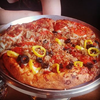 Impellizzeri's Pizza - 10 inch meat pizza with banana peppers and black olives added to half. Great for two or three people. - Pizza Near Me - Louisville, Kentucky Impellizzeri's Pizza - 10 inch meat pizza with banana peppers and black olives added to half. Great for two or three people. - Pizza Near Me - Louisville, Kentucky