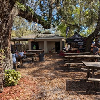 Broken Spoke Saloon - Seating area with outdoor restrooms - Pubs Near Me - Ormond Beach, Florida