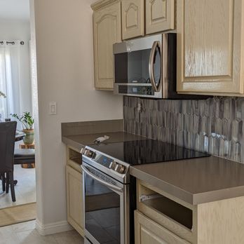 Abrica Construction Services - Countertops backsplash - Flooring Near Me