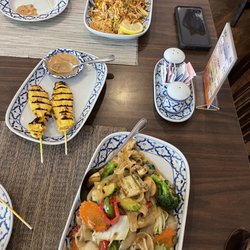 Siam Thai Restaurant - Veggie drunken noodles, chicken pad Thai, and chicken satay