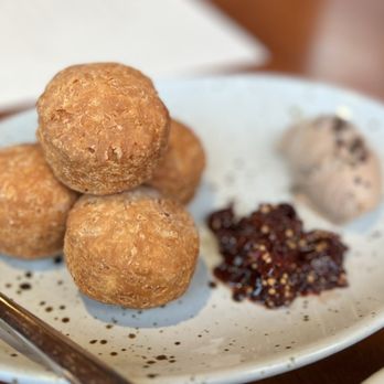 The Wolf - Duck liver pâté comes with this adorable fried biscuit. The late was sinfully delish!! - New American Near Me - Oakland, California
