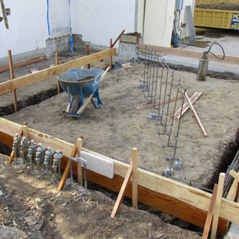 MDM Custom Remodeling - Day 5. With the concrete slab gone, fencing for the poured in place concrete foundation is built. Rebar will reinforce the concrete. - General Contractors Near Me - Los Angeles, California MDM Custom Remodeling - Day 5. With the concrete slab gone, fencing for the poured in place concrete foundation is built. Rebar will reinforce the concrete. - General Contractors Near Me - Los Angeles, California