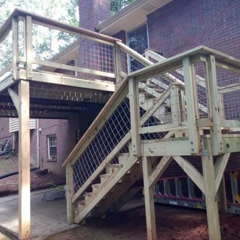 Creative Construction - Deck with hog rail fence balusters - General Contractors Near Me