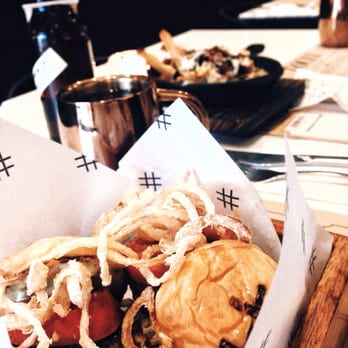 Pound By Todd English - 2 Mini Burgers and a fries with bacon toppings. Good for 2 for only Php 400. - Burgers Near Me - Taguig, NCR