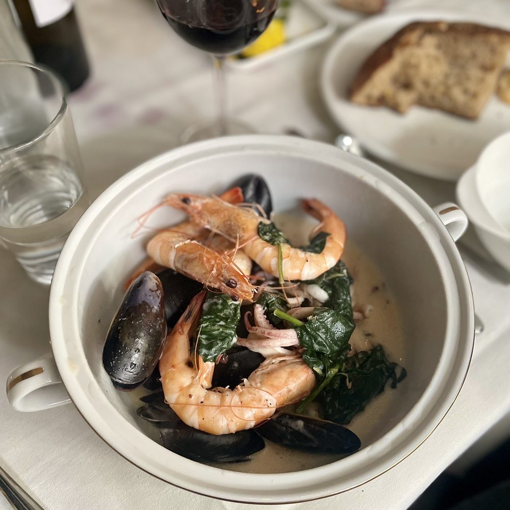 The shellfish waterzooi would be great with a dry bubbly or white wine. The shellfish waterzooi would be great with a dry bubbly or white wine.