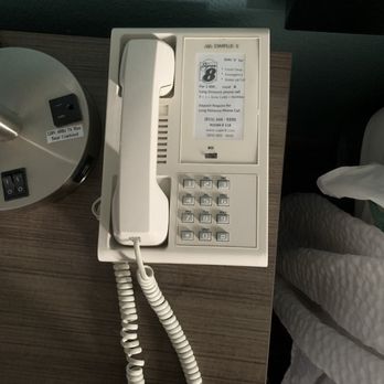 Super 8 by Wyndham McHenry - Dont bother calling front desk-the phone has no cord & so no connection... - Hotels Near Me - McHenry, Illinois