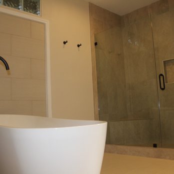 Your Kitchen Pro - a bathtub in a bathroom - General Contractors Near Me Your Kitchen Pro - a bathtub in a bathroom - General Contractors Near Me