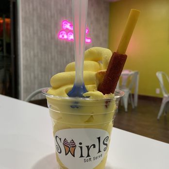 Swirls Soft Serve - Mango Soft Serve Non Dairy with a Tamarindo Stick - Ice Cream & Frozen Yogurt Near Me - Upland, California Swirls Soft Serve - Mango Soft Serve Non Dairy with a Tamarindo Stick - Ice Cream & Frozen Yogurt Near Me - Upland, California