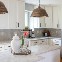 Wisconsin Granite - Taj Mahal Quartzite in a brushed finish.