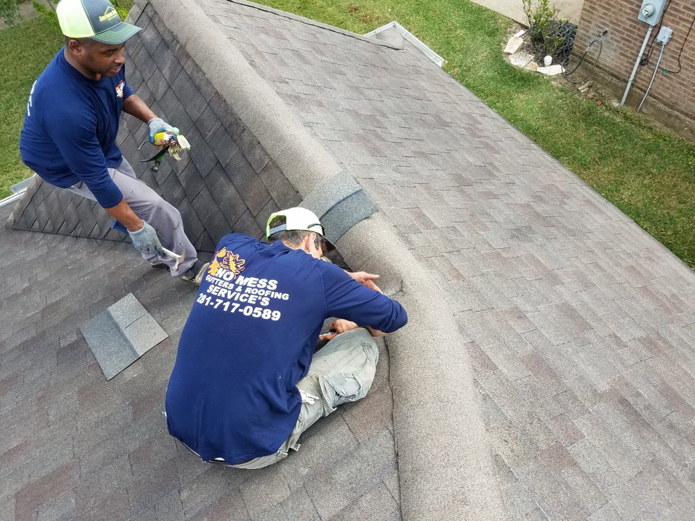 Slide of No Mess Gutters And Roofing Services