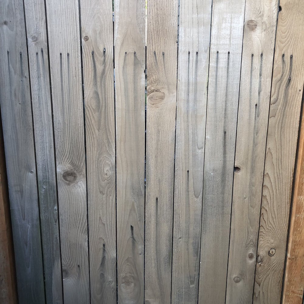 Quick Fencing - a close up of a wooden fence - Fences & Gates Near Me - Sumner, Washington Quick Fencing - a close up of a wooden fence - Fences & Gates Near Me - Sumner, Washington