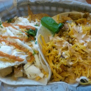 Torchy's Tacos - On the right, the 'Tipsy Chick'.  On the left, the Jack of Clubs - though this one had a VERY runny egg inside! - Tex-Mex Near Me - Waco, Texas
