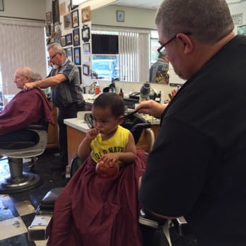 Gene's Barbershop - My son didn't want the smock so he got a little hairy. No biggie. - Barbers Near Me - Newark, California Gene's Barbershop - My son didn't want the smock so he got a little hairy. No biggie. - Barbers Near Me - Newark, California