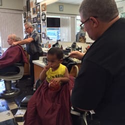 Gene's Barbershop - My son didn't want the smock so he got a little hairy. No biggie.