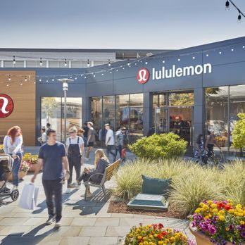 The Village at Corte Madera - Shoppers gather outside lululemon in a flower-filled courtyard at The Village at Corte Madera. - Shopping Centers Near Me - Corte Madera, California The Village at Corte Madera - Shoppers gather outside lululemon in a flower-filled courtyard at The Village at Corte Madera. - Shopping Centers Near Me - Corte Madera, California