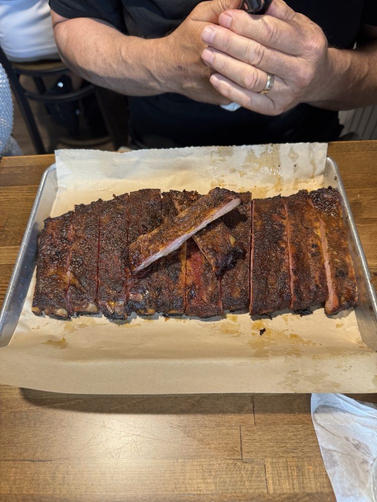 Woodstack Bbq Tavern Logo