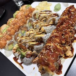 Dynamite Roll 16. Tempura Shrimp Roll (10 Pieces) Tuna Poke Roll 10. Sakura Roll (10 Pieces) and Sakura roll (right to left)