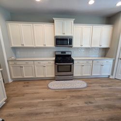Integrity Floors - Backsplash and lvp go great together