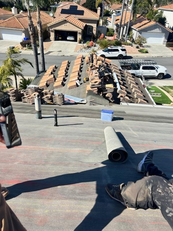 Slide of Early Roofing Rosendo