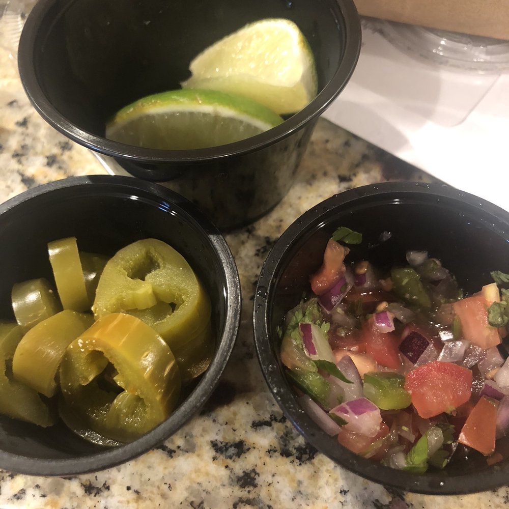 Salsitas Grill - Small cups of fixings for the nachos - Tacos Near Me - La Plata, Maryland Salsitas Grill - Small cups of fixings for the nachos - Tacos Near Me - La Plata, Maryland