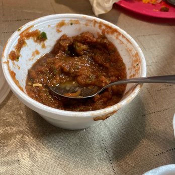 Perico's Albuquerque - a bowl of chili with a spoon - Mexican Near Me - Albuquerque, New Mexico