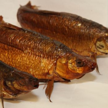 Banner Smoked Fish - three dried fish on a white surface - Seafood Markets Near Me - Brooklyn, New York Banner Smoked Fish - three dried fish on a white surface - Seafood Markets Near Me - Brooklyn, New York